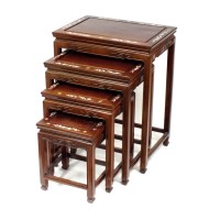 Lot 290 - A Chinese inlaid rosewood nest of four tables,...