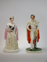 Lot 15 - A pair of Victorian Staffordshire figures,...