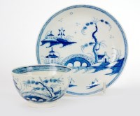 Lot 47 - A Caughley teabowl and saucer in the Bridge...