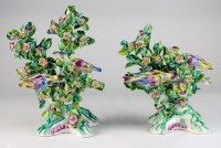 Lot 69 - A pair of Bow bird porcelain bocage groups,...