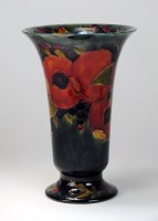 Lot 95 - A William Moorcroft pottery trumpet vase...