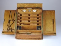 Lot 124 - A late Victorian oak stationary box, retailed...