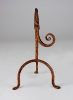 Lot 140 - An 18th century wrought iron rush light, on...