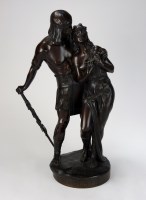 Lot 151 - A dark brown patinated bronze figure group...