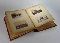 Lot 160 - A Victorian photograph album with leather...