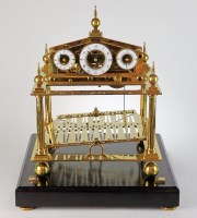 Lot 168 - A 20th century gilt brass 'Congreve' type...