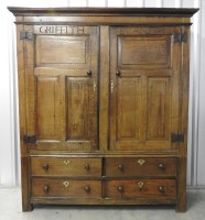 Lot 183 - A late 17th century oak livery cupboard, the...