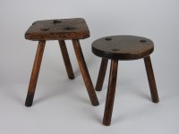 Lot 193 - Two 19th century primitive milking stools, one...