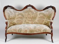 Lot 208 - A Victorian walnut serpentine sofa, the well...