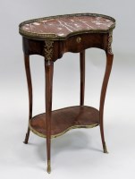 Lot 211 - A 19th century Louis XV style kidney shaped...