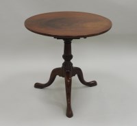 Lot 212 - A 19th century mahogany tilt-top supper table...