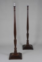 Lot 214 - A pair of 19th century and later mahogany lamp...