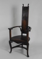 Lot 222 - A late 19th century Arts and Crafts style oak...