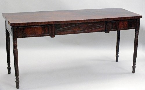 Lot 230 - A Regency mahogany serving table of country...
