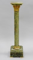 Lot 232 - A 20th century green onyx column, the 21.5cm...