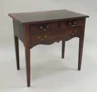 Lot 250 - A George III mahogany lowboy the rectangular...