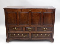 Lot 264 - A George III oak mule chest, the three plank...