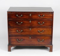 Lot 268 - A George III mahogany chest of four long...