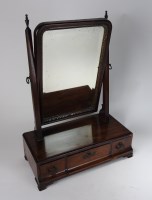 Lot 274 - A George III mahogany swivel toilet mirror,...