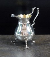 Lot 8 - An early George III silver cream jug, makers...