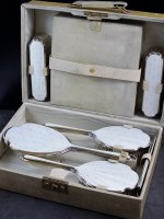 Lot 36 - A cased silver and guilloche enamel dressing...
