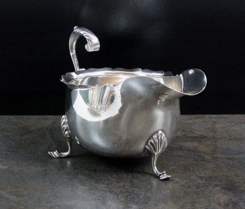 Lot 40 - A Victorian silver sauce boat, D & M Davis,...