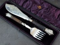 Lot 102 - A cased pair of Victorian horn and silver...