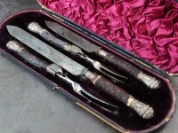 Lot 103 - A cased set of Victorian silver mounted horn...