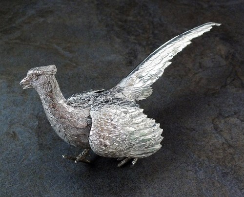 Lot 117 - A continental silver pheasant table ornament,...
