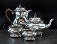 Lot 128 - A George V four piece silver tea service,...