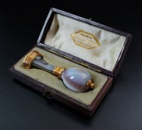 Lot 139 - A cased banded agate intaglio seal, with...
