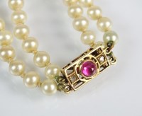 Lot 156 - A ruby and diamond set clasp, designed as a...