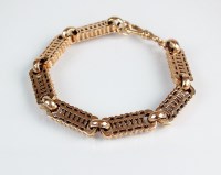 Lot 167 - A Victorian decorative pierced panel bracelet,...