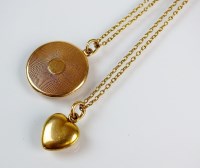 Lot 181 - A yellow metal heart shaped locket pendant,...