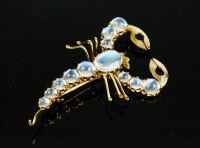 Lot 187 - A moonstone scorpion brooch, comprising twelve...