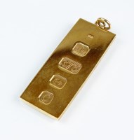 Lot 196 - A 9ct gold ingot pendant, hallmarked...