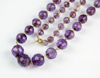 Lot 198 - A graduated amethyst bead necklace, comprising...