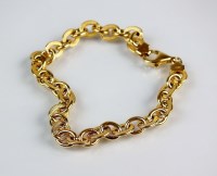 Lot 199 - A yellow metal oval link bracelet, designed as...