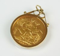 Lot 207 - A 1910 sovereign pendant, within 9ct gold...