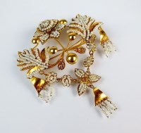 Lot 214 - A seed pearl set brooch, designed as a central...