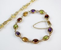 Lot 215 - A multi gem set bracelet, designed as eleven...