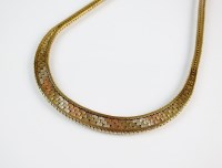 Lot 217 - A 9ct tri-coloured gold collarette, with...