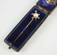 Lot 226 - A moonstone and diamond set turtle stick pin,...