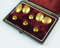 Lot 227 - A pair of 15ct gold oval cufflinks, each with...