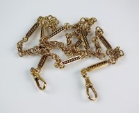 Lot 230 - A 9ct gold decorative link Albert, with...
