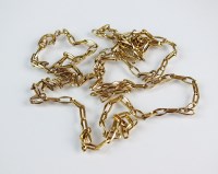 Lot 231 - A 9ct gold faceted oval link chain, with bolt...