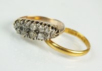 Lot 281 - A twelve stone two row graduated diamond set...