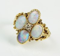 Lot 284 - An 18ct gold Victorian style opal and diamond...