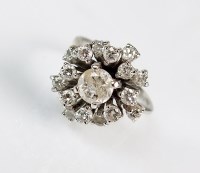 Lot 286 - An 18ct white gold diamond cluster ring,...