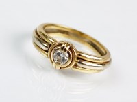 Lot 291 - A single stone diamond ring, designed as a...